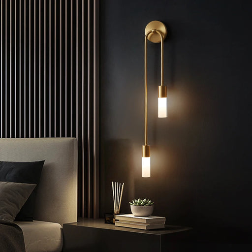 Modern black and gold LED wall sconce with up and down light direction and frosted acrylic shade for bedroom and bathroom lighting