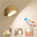 Minimalist rechargeable LED wall light with magnetic mount, touch control buttons, and warm ambient lighting

