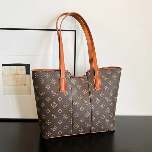 Fashionable Women’s Leather Shoulder Bag made from luxurious microfiber synthetic leather with solid design and spacious interior for everyday use.