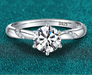 D Color VVS1 round-cut moissanite bridal ring in sterling silver with zircon accents