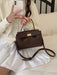 Lightweight PU leather women's box bag with twist lock, structured shape