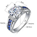 2ct Moissanite Ring – D Color VVS1 with Blue Sapphire Accent SF