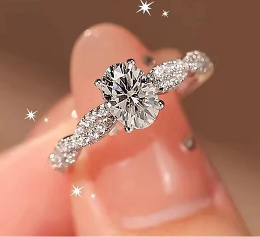 Platinum-plated moissanite ring with a bright stone-set design for women.