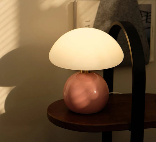 Modern dimmable LED table lamp with brushed nickel finish and frosted glass shade for bedroom.
