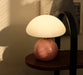 Modern dimmable LED table lamp with brushed nickel finish and frosted glass shade for bedroom.