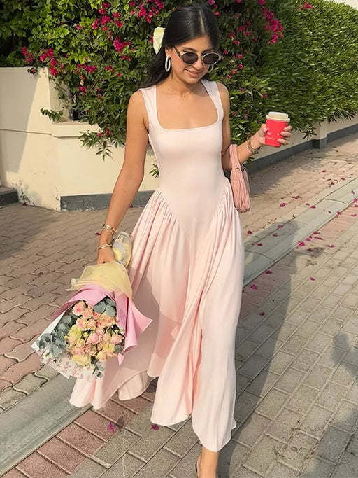 Woman wearing Chin.Sweety ankle-length slim fit camisole dress with square neckline and spaghetti straps