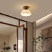 “Modern glass and wood LED ceiling lamp for bedrooms, living rooms, and office spaces”