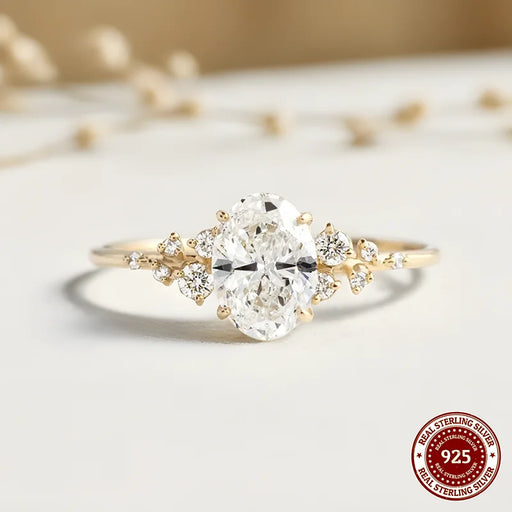 Oval D Color VVS1 Moissanite Gold-Plated Sterling Silver Ring with Zircon Side Stones