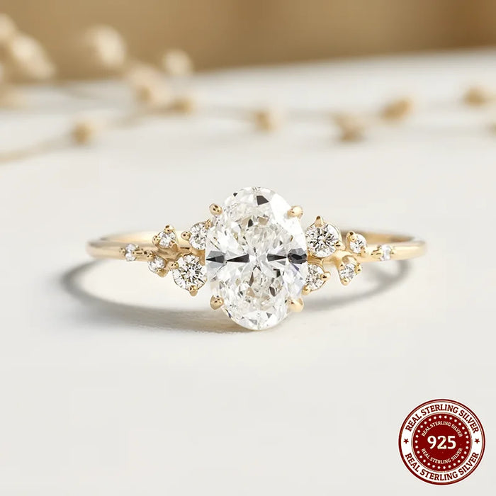 Oval D Color VVS1 Moissanite Gold-Plated Sterling Silver Ring with Zircon Side Stones