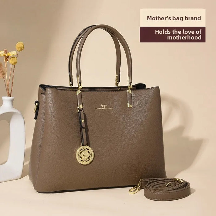 Elegant commuter tote bag in solid color with detachable strap, displayed as both shoulder bag and crossbody option, spacious and stylish design for men and women.