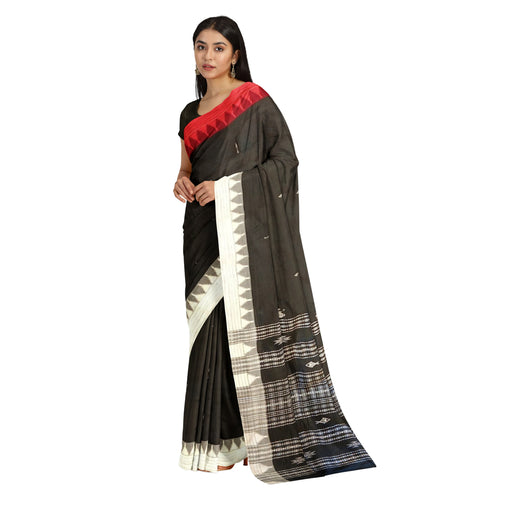 Handwoven Kotpad Saree in cotton and tussar silk with tribal motifs and earthy Aul tree dyes from Odisha