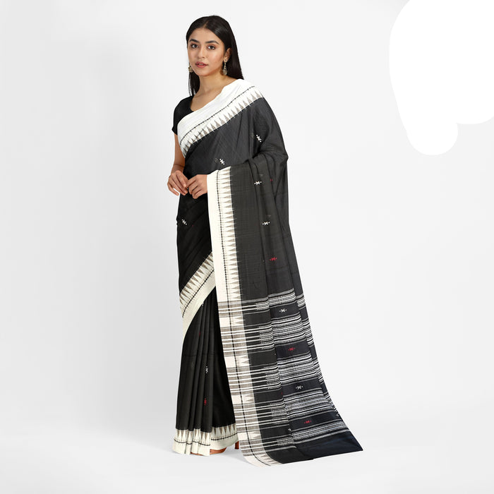 Handwoven Kotpad Saree from Odisha in cotton and tussar silk with tribal-inspired patterns and natural Aul tree dyes