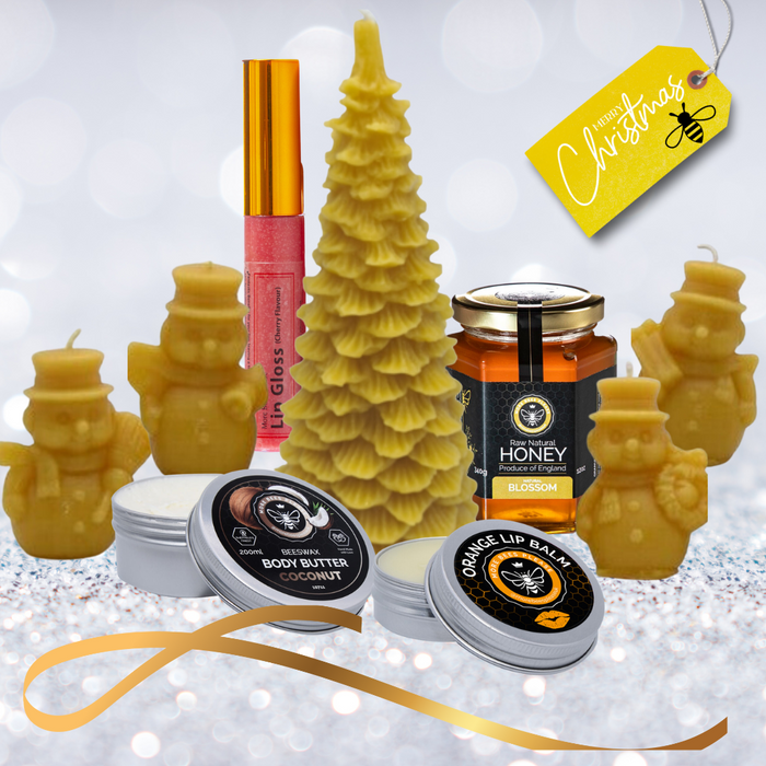 Deluxe holiday gift hamper with beeswax candles, skincare, snowmen candles and blossom honey