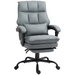 Black reclining swivel chair with footrest and thick padding, placed in a modern home office setting


