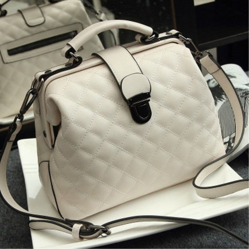 Retro doctor messenger bag in PU leather with top handle and zipper closure for women.