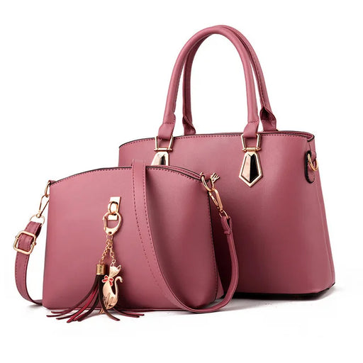 Soft PU leather composite handbag with tassel decoration and zipper closure, casual yet elegant tote for women.