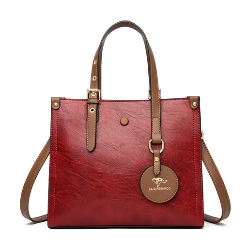 Vintage split leather tote handbag with zipper and hasp closure, casual shoulder bag for women with multiple compartments.