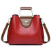 Luxury designer tote handbag in microfiber leather with a vintage design, zipper closure, and multiple compartments.