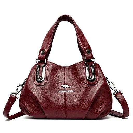 Luxury soft leather tote handbag with three-layer design, zipper closure, and elegant sequined details.