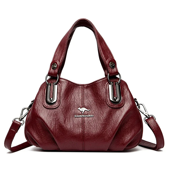 Luxury soft leather tote handbag with three-layer design, zipper closure, and elegant sequined details.