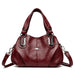 Luxury soft leather tote handbag with three-layer design, zipper closure, and elegant sequined details.