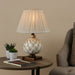 Layer table lamp with antique cream artichoke-inspired base, mottled gold wooden plinth, and pleated ecru shade

