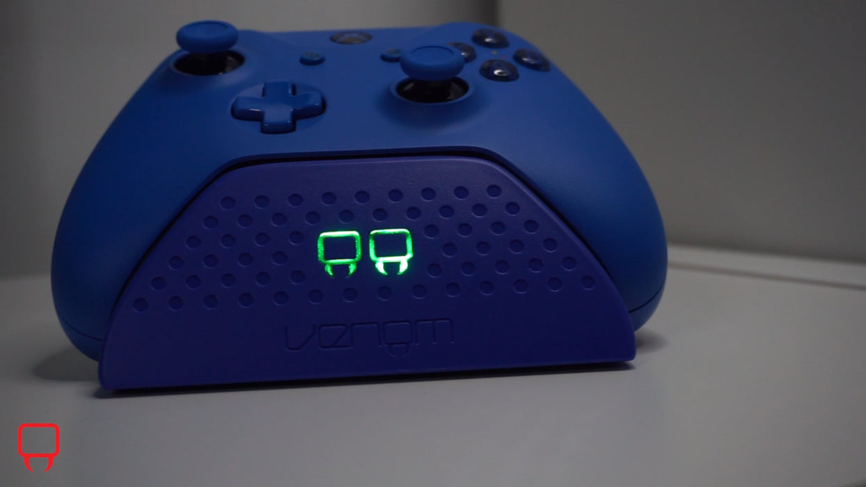 Xbox controller charging dock with dual rechargeable battery packs and LED indicators

