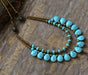 Handcrafted boho turquoise choker with natural jasper and agate stones on seed bead strand