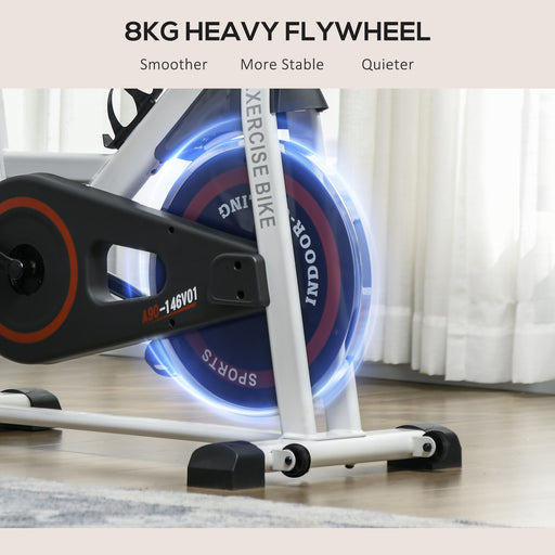 Heavy-duty indoor spin bike with 8kg flywheel, LCD display, and adjustable resistance for home workouts