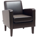 Modern compact brown PU leather armchair with wooden frame and sloped arms in small living room


