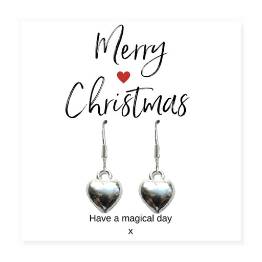 Pair of silver heart shaped drop earrings with Sterling Silver plated, nickel-free hooks, displayed on a "Merry Christmas" message card inside a black box.