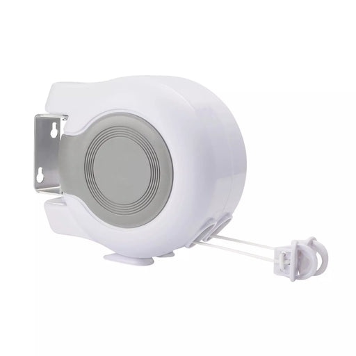 Double retractable clothesline mounted on wall for outdoor laundry drying