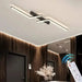 Modern LED line ceiling lamp with sleek strip design illuminating a stylish indoor space