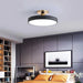 Nordic Macaron ceiling LED light with pastel colors and remote dimming in modern interior