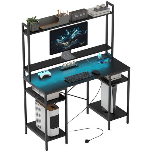 Ergonomic black desk with RGB LED lights, charging ports, monitor stand, and storage shelves