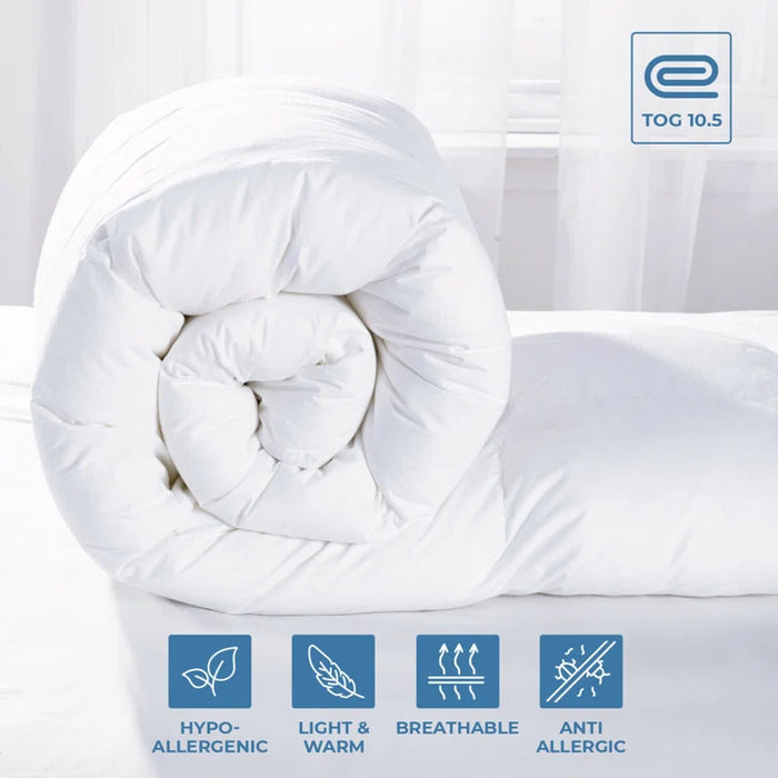 Soft polyester duvet in classic white, machine washable and hypoallergenic, providing comfort for all seasons.