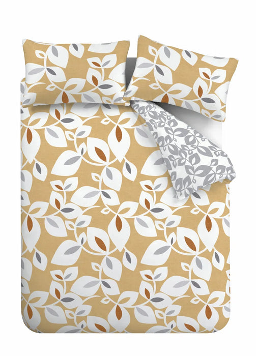 Modern duvet cover set with soft teal and ochre leaf print, complementing tonal leaf reverse.