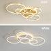 Sleek black and gold LED ceiling chandelier with remote control and flush mount installation