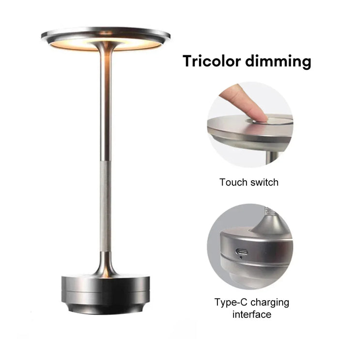 Wireless LED desk lamp with touch control and dimming feature in black and brushed nickel finish for modern lighting solutions.