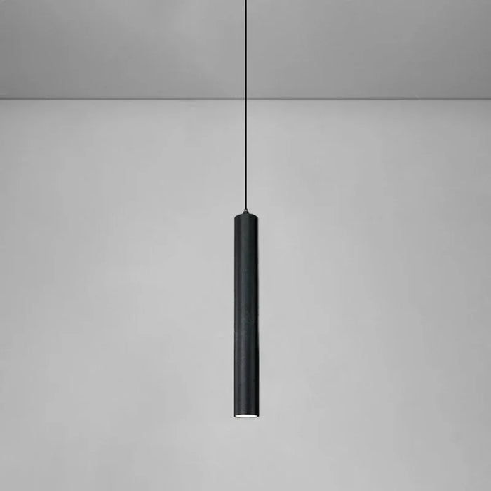 Nordic cylinder LED pendant light with black aluminum shade in modern dining room