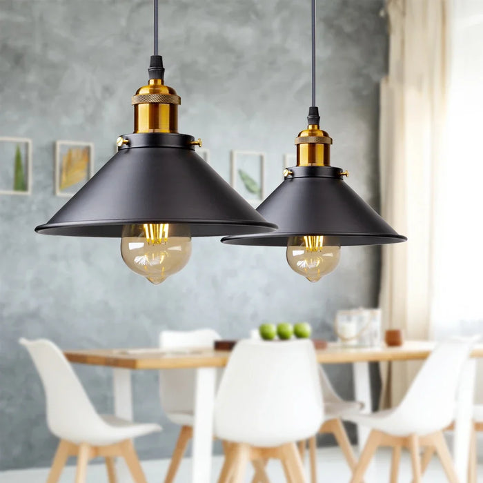 Vintage iron pendant light with rustic industrial design for farmhouse interiors