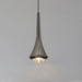Modern aluminum pendant light hanging over a stylish dining space