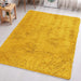 Plush shaggy area rug with high-density pile in a modern living room setting
