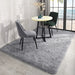 Soft grey shaggy area rug with deep pile and jute backing for cosy indoor and outdoor spaces

