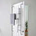 Over-the-door towel and clothes rack with five rails and non-slip rubber hooks