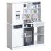 White wooden kids toy kitchen set with fridge, microwave, sink, and accessories