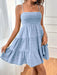 Woman wearing a lightweight casual summer dress made from soft stretchy fabric, ideal for warm weather