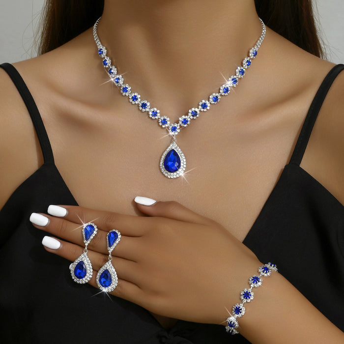Affordable celestial rhinestone necklace, earrings, and bracelet set for brides and bridesmaids