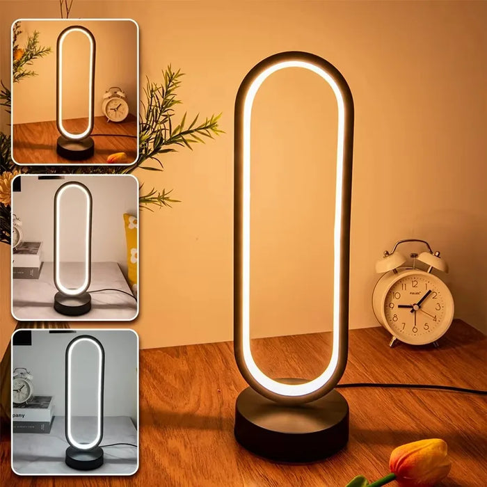 Letter G LED ring lamp on a modern desktop as a stylish decorative accent