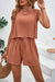 Two-piece loungewear set with round neck top and drawstring shorts in lightweight fabric